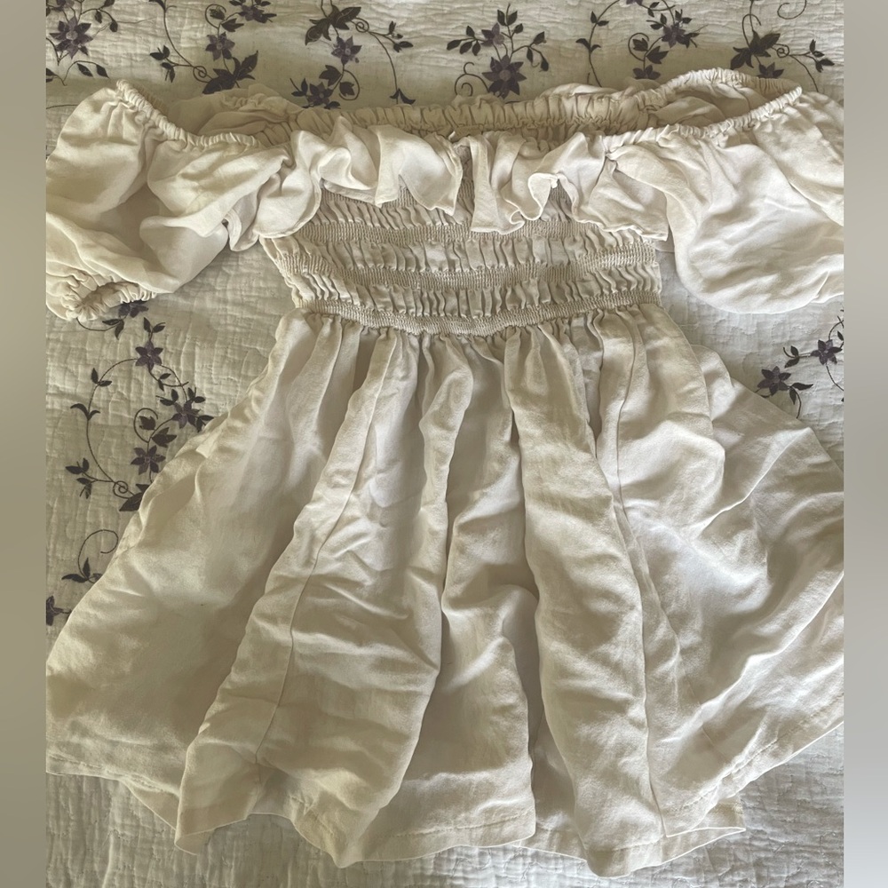 Cream ruffle mini dress